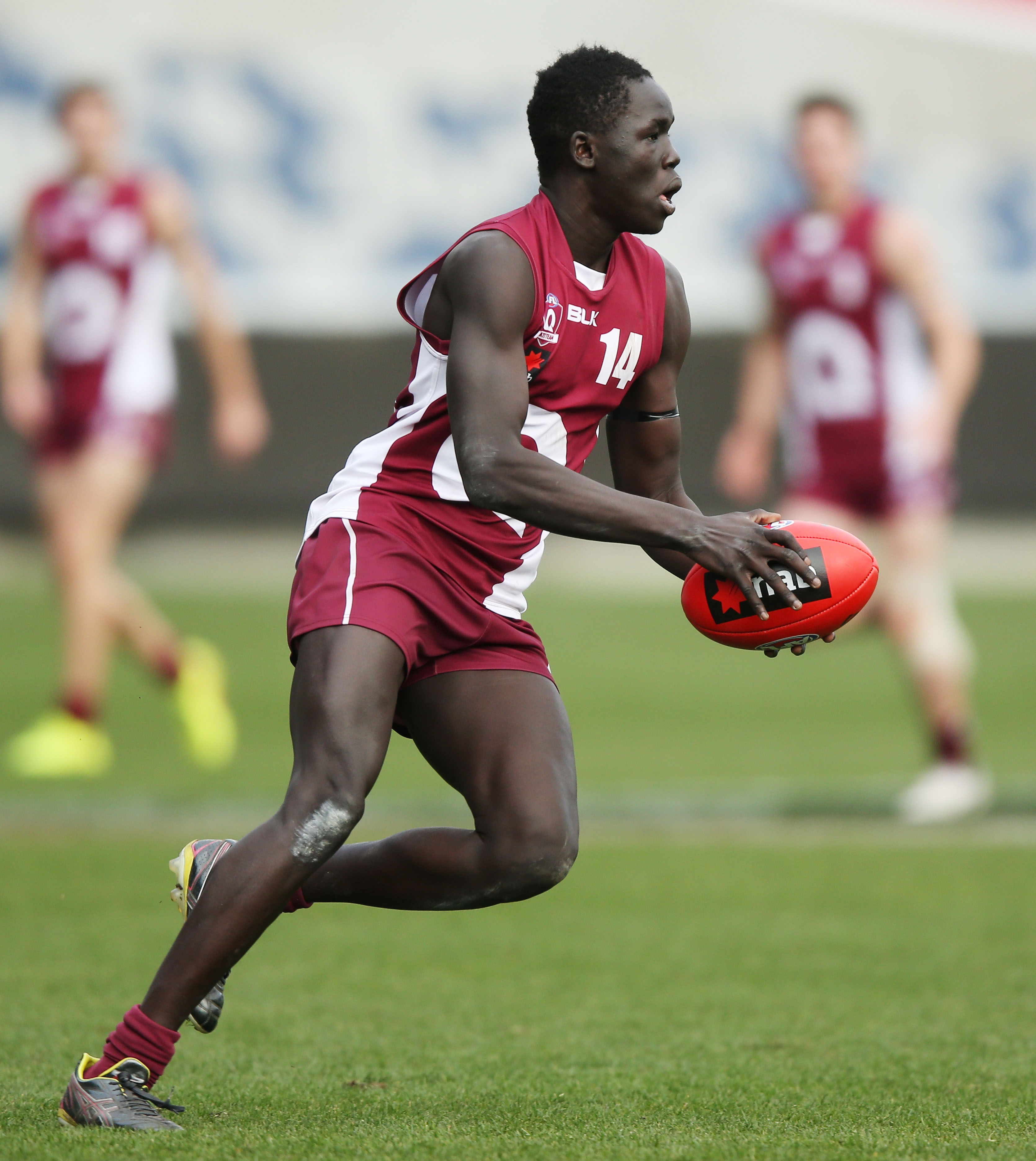 GEELONG, AUSTRALIA - JUNE 27: Reuben William of Queensland runs with the ball during the 2015 AFL Under 18 match between Queensland and Tasmania at Simonds Stadium, Geelong on June 27, 2015. (Photo by Michael Dodge/AFL Media)
