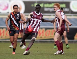 Aliir Aliir of QLD in action during the 2012 NAB AFL Under 18 Championship between Northern Territory and Queensland at Visy Park, Melbourne. (Photo: Darrian Traynor/AFL Media)