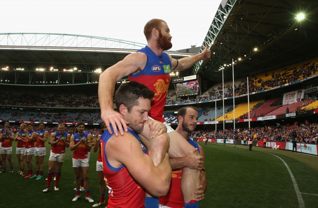 MELBOURNE, AUSTRALIA - AUGUST 28: Daniel Merrett of the Lions is acknowledged after playing his last AFL game after the 2016 AFL Round 23 match between the St Kilda Saints and the Brisbane Lions at Etihad Stadium on August 28, 2016 in Melbourne, Australia. (Photo by Sean Garnsworthy/AFL Media)